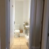 Photo 4: Bathroom with large shower taken from entrance