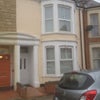 Photo 9: Front elevation of house