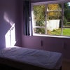 Photo 3: bedroom with view of garden