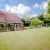 Photo 2: House from garden