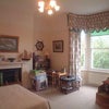 Photo 4: Larger bedroom - decor is now more 'modern'.