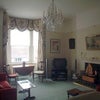 Photo 5: Lounge - again, now decorated in a more contemporary style than in the photo.