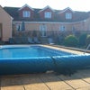Photo 7: Swimming pool, stairs to terrace, garden, summer house and sun deck.  