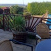 Photo 8: One of the outside seating areas, with wide reaching views 