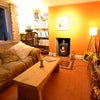Photo 6: cosy lounge with wood burner