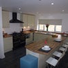 Photo 3: The Kitchen Area