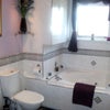 Photo 2: BATHROOM WITH SHOWER OVER BATH