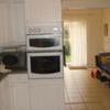 Photo 2: Kitchen through to Dining room