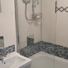 Photo 8: Upstairs electric shower over bath