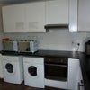 Photo 8: Shared kitchen with Washing Machine and Dryer