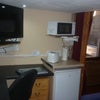 Photo 7: Microwave, Kettle, Toaster & Fridge