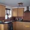 Photo 2: Fully integrated kitchen & dining rm, own personal storage space!