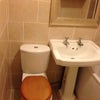 Photo 3: Sink and toilet