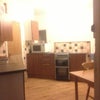 Photo 3: kitchen from back door entrance