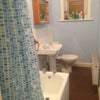 Photo 6: bathroom with electric shower