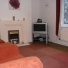 Photo 2: living room with 5 sofa seats