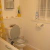Photo 3: Bathroom - everyone has own shower caddy and shelf