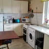 Photo 2: Spacious Kitchen/with Breakfast table bar