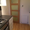 Photo 6: kitchen viewing towards the door which leads from the hall