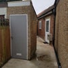 Photo 9: Outside rear with bike storage