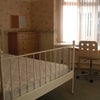 Photo 4: Light, airy bedroom over-looking garden.