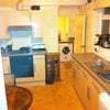 Photo 2: Kitchen has two fridges and a dishwasher and the utility room has a washer drier