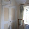 Photo 2: Generous cupboard with hanging space and shelves