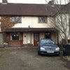 Photo 2: Front of house with plenty of off road parking