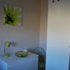 Photo 3: chest of draws bed side lamp and wall canvas