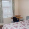 Photo 6: Bedroom 1 front