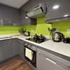 Photo 9: This image from the website is of a smaller kitchen. Mine is much larger as it is a 5 bed. 