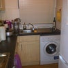 Photo 4: Kitchen with washer+dryer