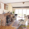 Photo 3: Lounge with wood Fire