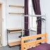 Photo 5: Bedroom showing hanging space and desk