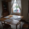 Photo 5: Large dining room table seats plenty of guests