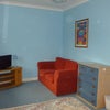 Photo 4: Room 2: Seating area