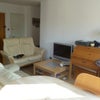 Photo 2: Bright shared sitting room