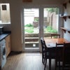 Photo 2: Kitchen & back patio