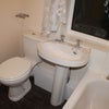 Photo 6: Large luxury bathroom with toilet and basin. The property has two toilet and basins