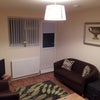 Photo 4: Lounge with tv sofa & dining table with chairs
