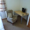 Photo 2: Bedroom - desk with TV.  Wifi.