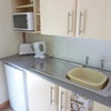 Photo 5: Kitchenette shared with one other person.