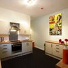 Photo 5: Kitchen showing cooker 2