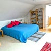 Photo 2: Large attic bedroom (1 of 2)