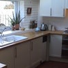 Photo 3: the kitchen has gas oven and hob and fridge