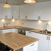 Photo 2: Immaculate, spacious & stylish kitchen with breakfast bar, 4 stools, TV and all mod cons