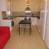 Photo 3: Kitchen and socialising area