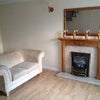 Photo 3: Front room and fireplace