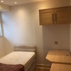 Photo 2: Bed, desk, shelves