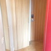 Photo 7: Entrance and Storage